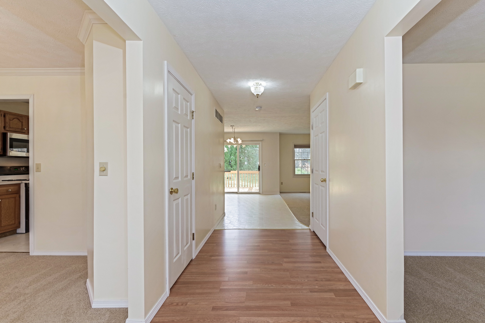 116 North Blair Drive Normal, IL 61761 - Photo 9 of 41 a view of a hallway with wooden floor