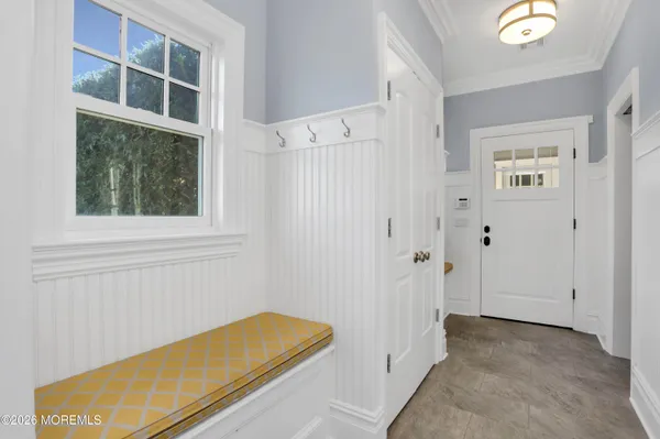 a view of a bathroom from a hallway