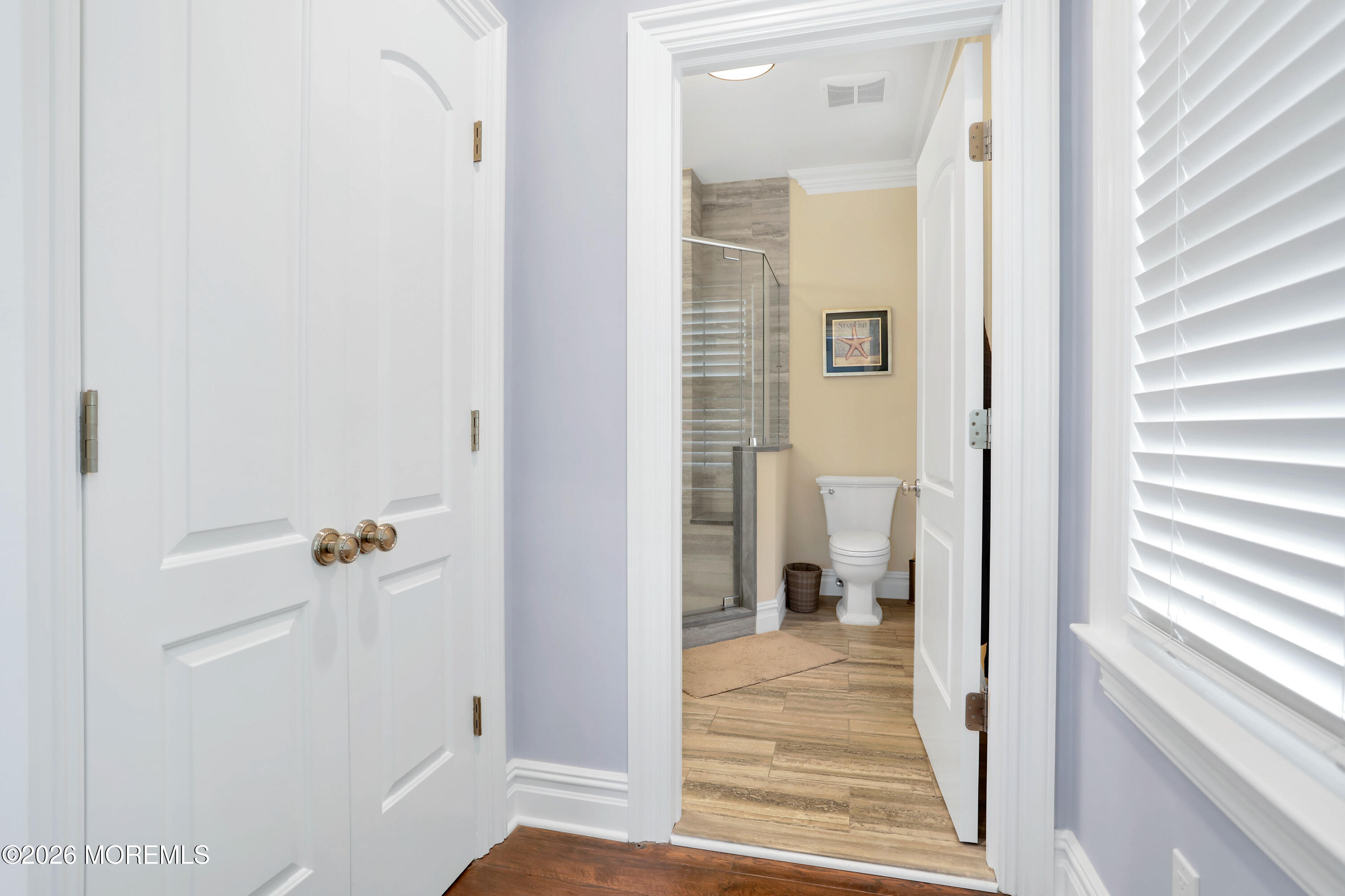 101 Tuttle Avenue Spring Lake, NJ 07762 - Photo 21 of 62 a view of a bathroom from a hallway