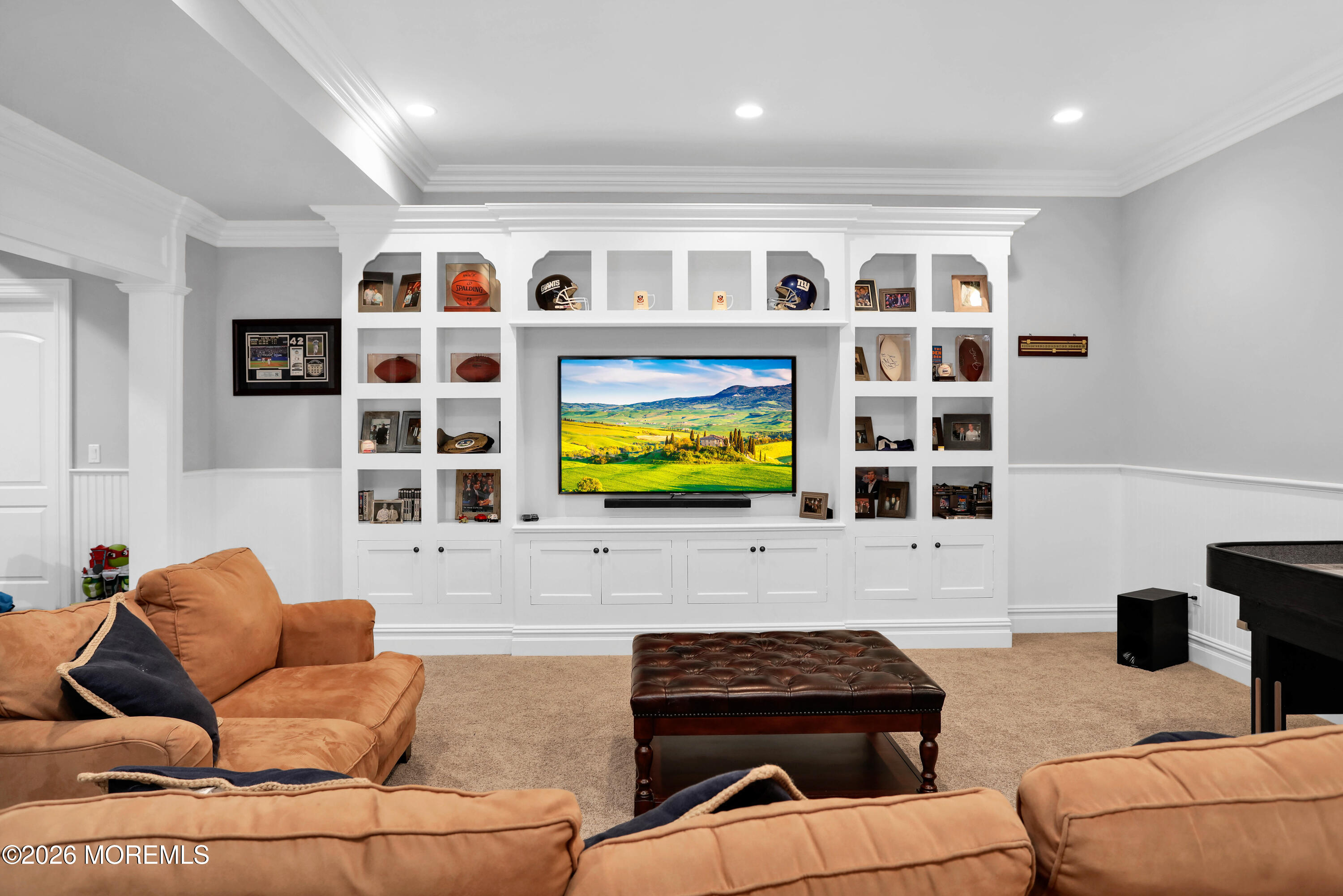 101 Tuttle Avenue Spring Lake, NJ 07762 - Photo 48 of 62 a living room with furniture kitchen view and a flat screen tv