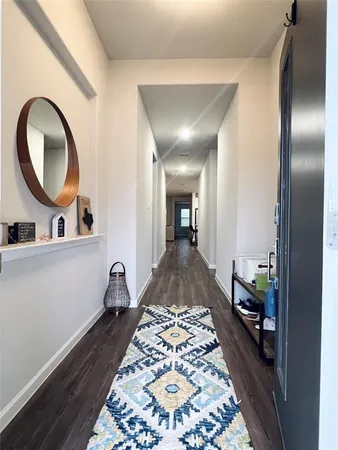 a very nice looking room with a large mirror