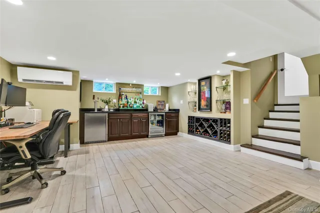 a view of kitchen with cabinets and wooden floor