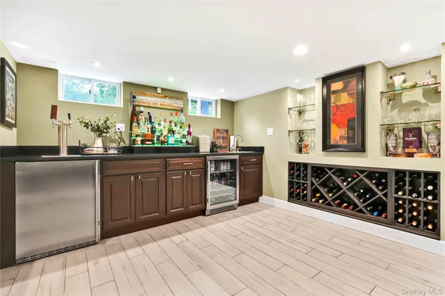 a kitchen with stainless steel appliances a stove and more cabinets