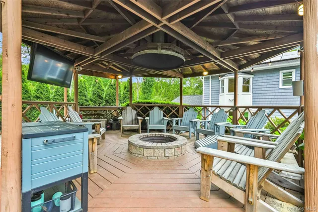 a view of a chairs and table in a patio