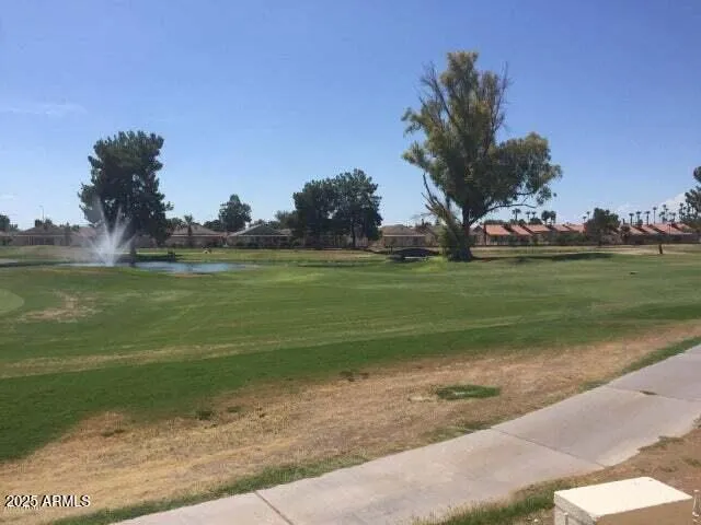 a view of a lake with a big yard