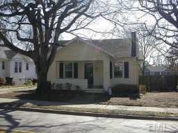 212 West Whitaker Mill Road Raleigh, NC 27608 - Photo 1 of 1 a front view of a house with yard and trees