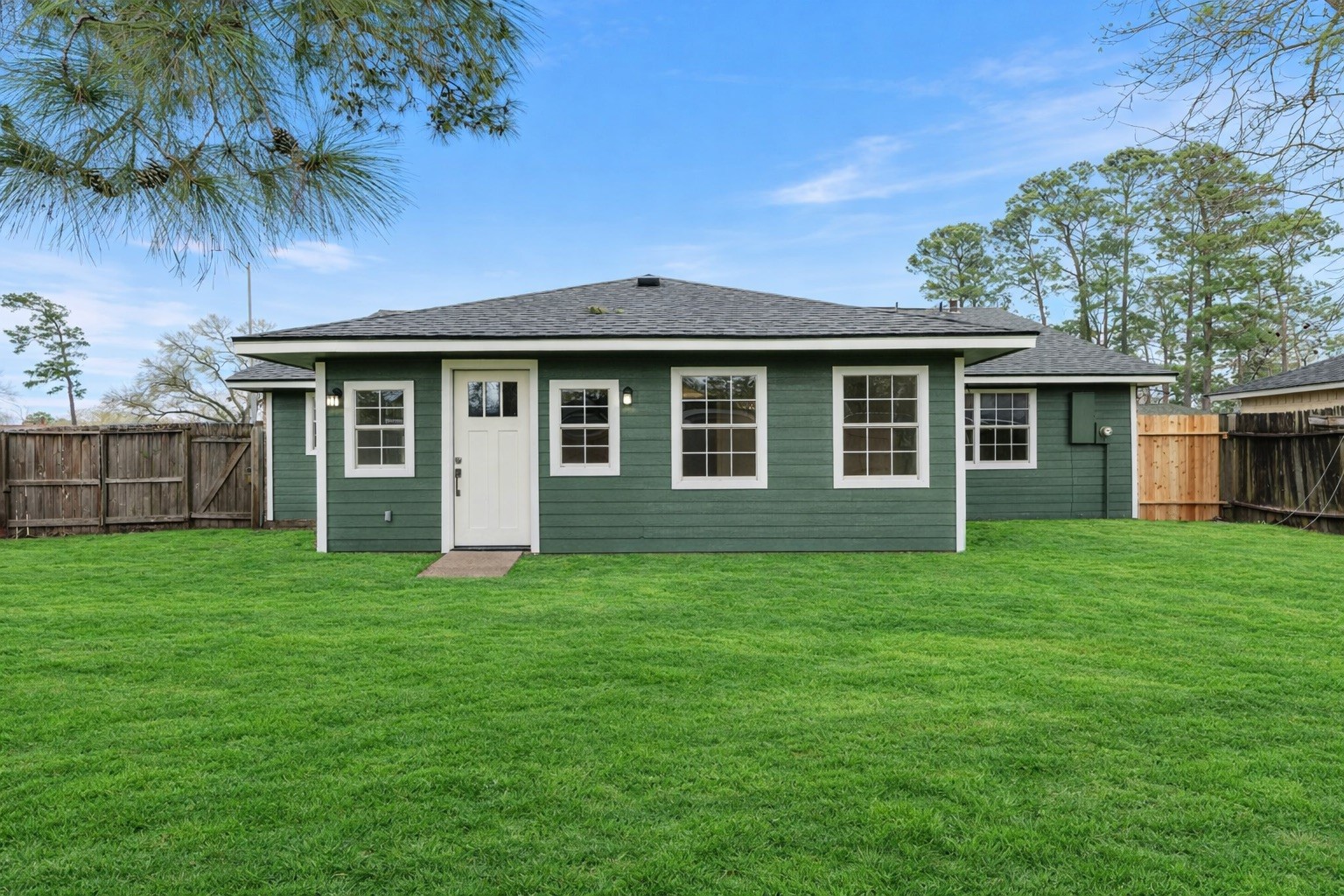 19711 Bishops Gate Lane Humble, TX 77338 - Photo 12 of 12 Spacious, fully fenced backyard with plenty of room to entertain, play, or expand.