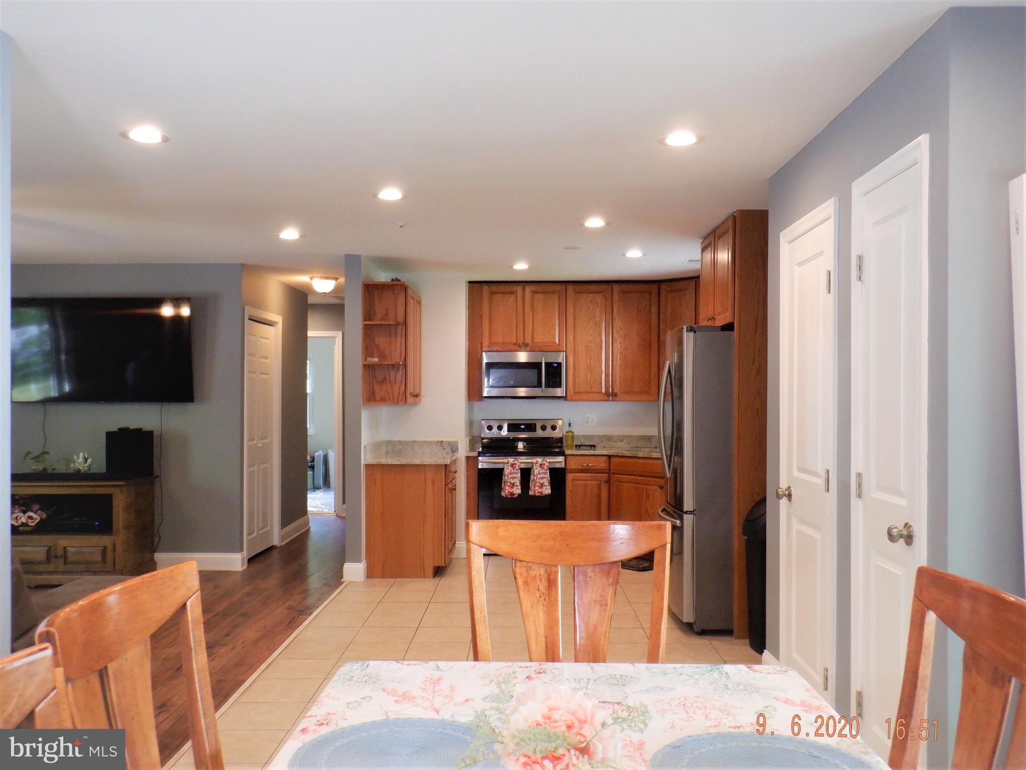 204 West Poplar Road Sterling, VA 20164 - Photo 3 of 18 Kitchen-Dining-2