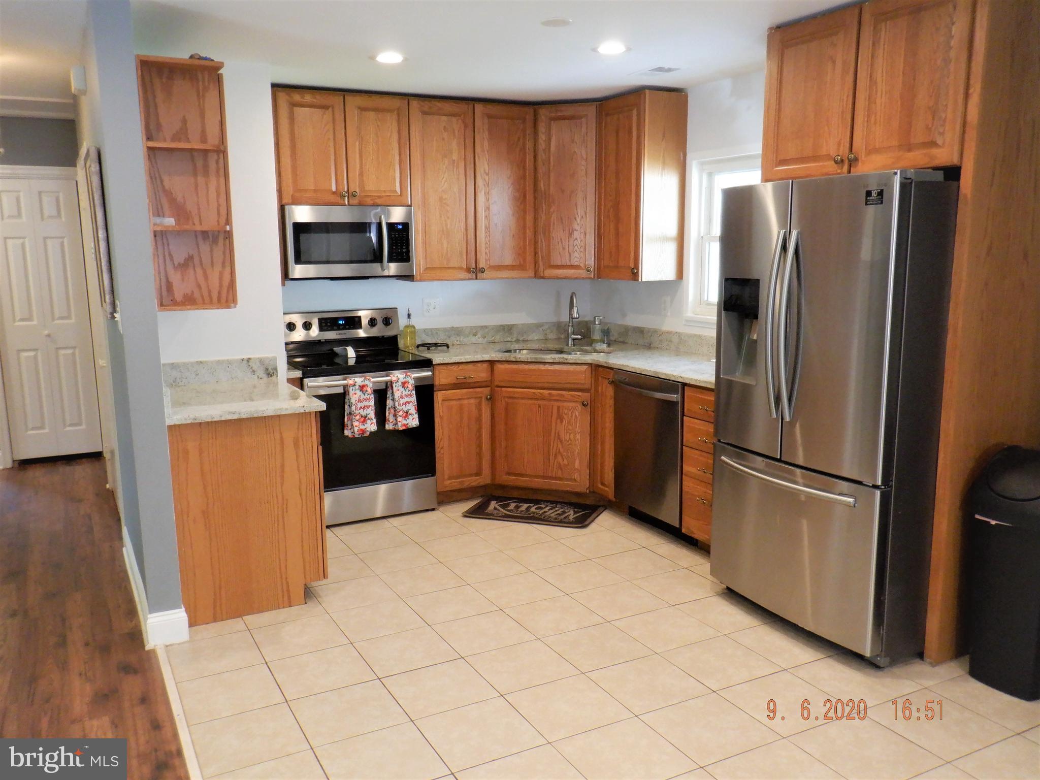 204 West Poplar Road Sterling, VA 20164 - Photo 5 of 18 Kitchen-Dining-4