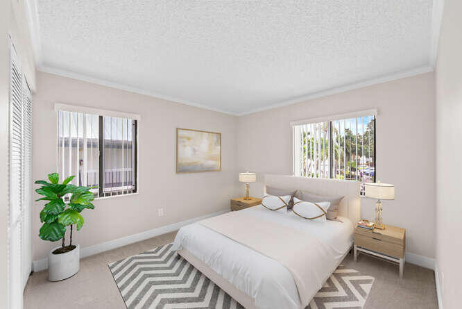 Undisclosed Address Stuart, FL 34994 - Photo 17 of 41 a bedroom with a bed and a window