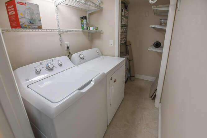Undisclosed Address Stuart, FL 34994 - Photo 22 of 41 a utility room with dryer and washer