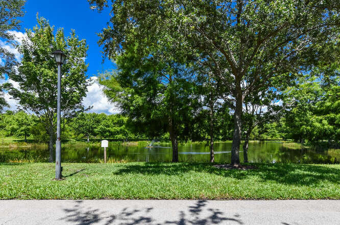 Undisclosed Address Stuart, FL 34994 - Photo 29 of 41 a view of a park with large trees