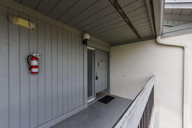 Undisclosed Address Stuart, FL 34994 - Photo 3 of 41 a view of an empty room with wooden floor