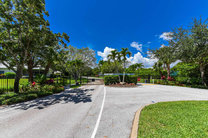 Undisclosed Address Stuart, FL 34994 - Photo 33 of 41 a backyard of a house with lots of green space