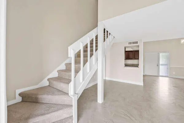 a view of workspace with wooden floor