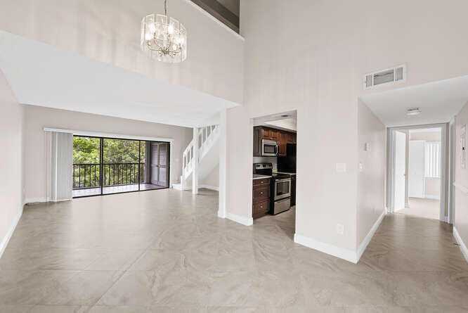 Undisclosed Address Stuart, FL 34994 - Photo 8 of 41 a view of an empty room with a window