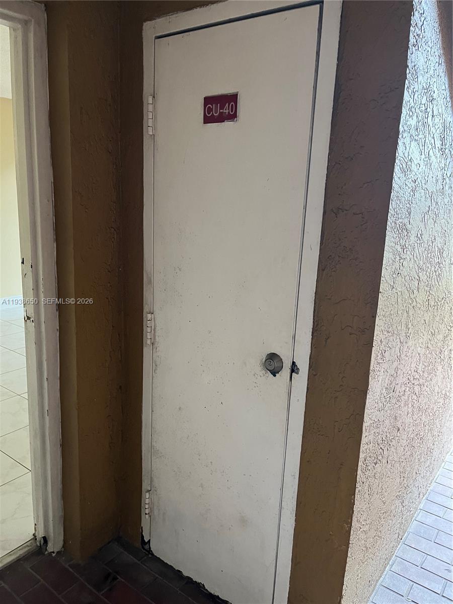 15630 Southwest 80th Street, Unit I110 Miami, FL 33193 - Photo 17 of 28 a bathroom with a shower