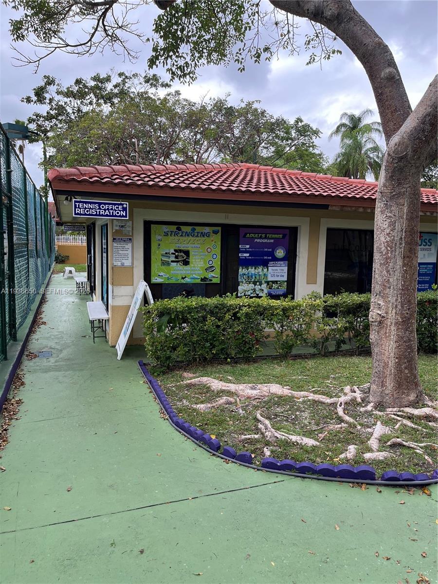 15630 Southwest 80th Street, Unit I110 Miami, FL 33193 - Photo 22 of 28 a view of a house with a porch