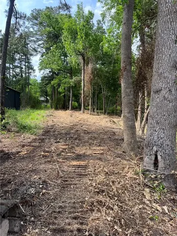 a fire hydrant in the middle of a field