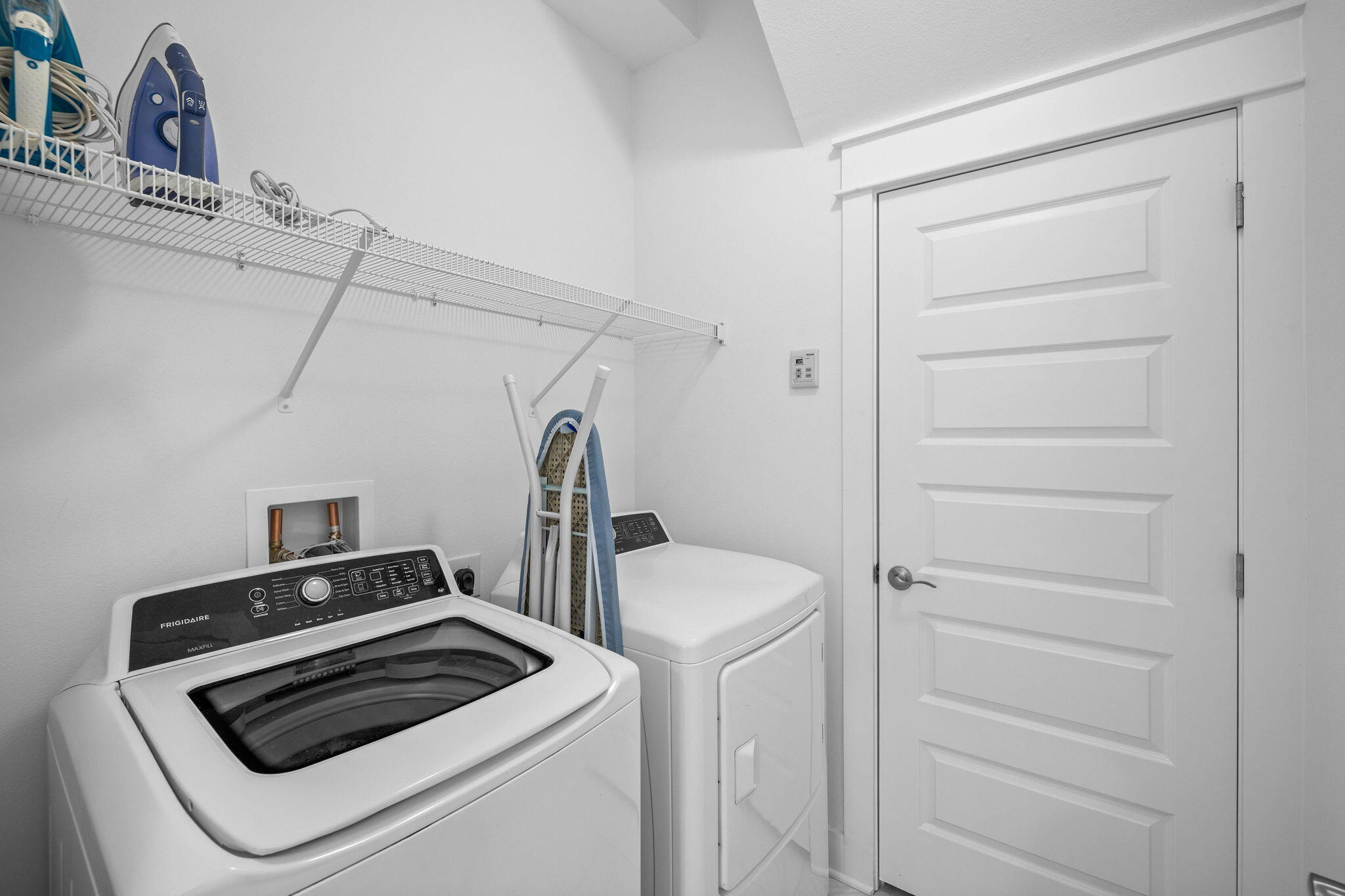 308 Milestone Dr Inlet Beach, Unit A Inlet Beach, FL 32461 - Photo 36 of 53 a view of storage and utility room with washer and dryer