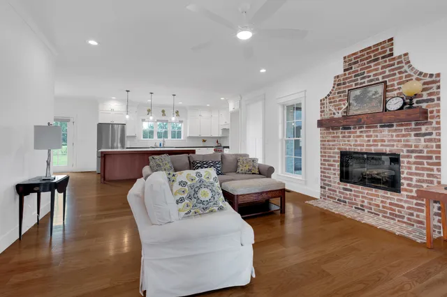 a large kitchen with stainless steel appliances kitchen island a large island in the center