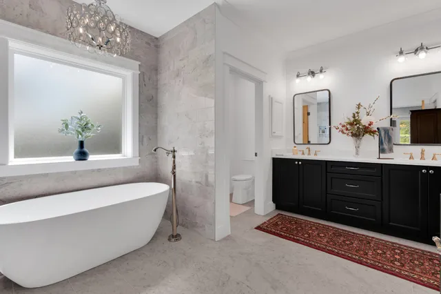 a living room with furniture gym equipment and a window