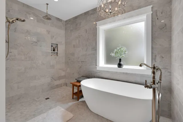 a view of a house with pool and a yard