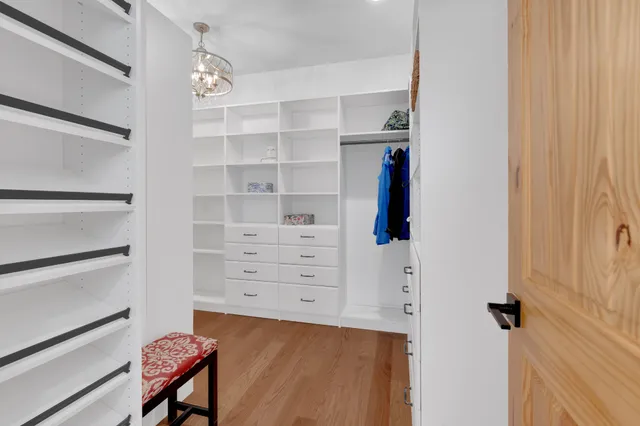 a view of a street with a yard