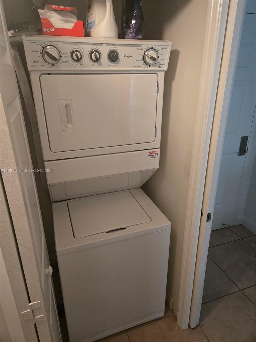 888 Douglas Road, Unit 405 Coral Gables, FL 33134 - Photo 18 of 24 washer and dryer inside the UNIT