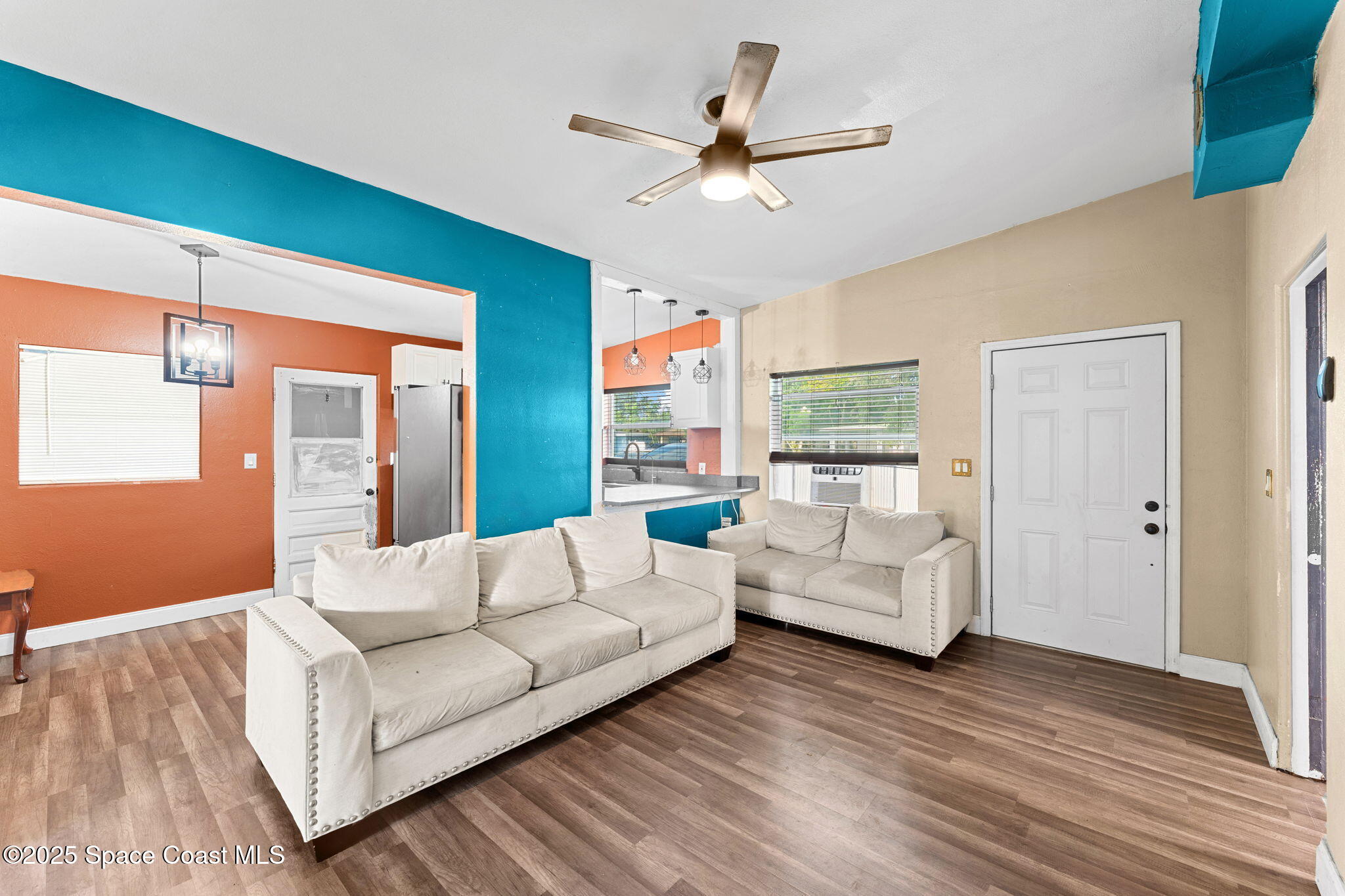 406 North Fiske Boulevard Cocoa, FL 32922 - Photo 3 of 21 a living room with furniture and a large window