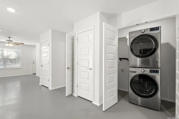 a kitchen with a stove and a microwave