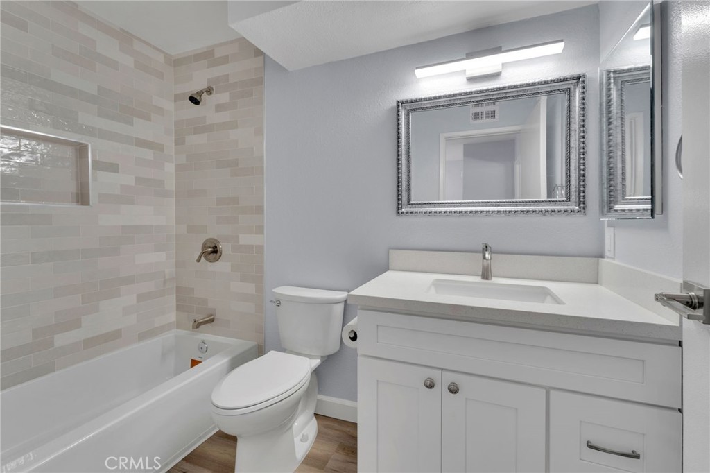 8703 Pine Crest Place Rancho Cucamonga, CA 91730 - Photo 20 of 36 a bathroom with a sink toilet tub and shower