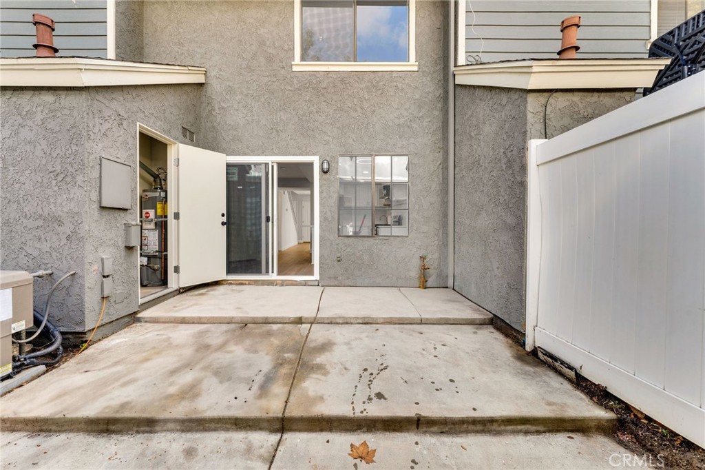 8703 Pine Crest Place Rancho Cucamonga, CA 91730 - Photo 25 of 36 a view of a brick house with a outdoor space