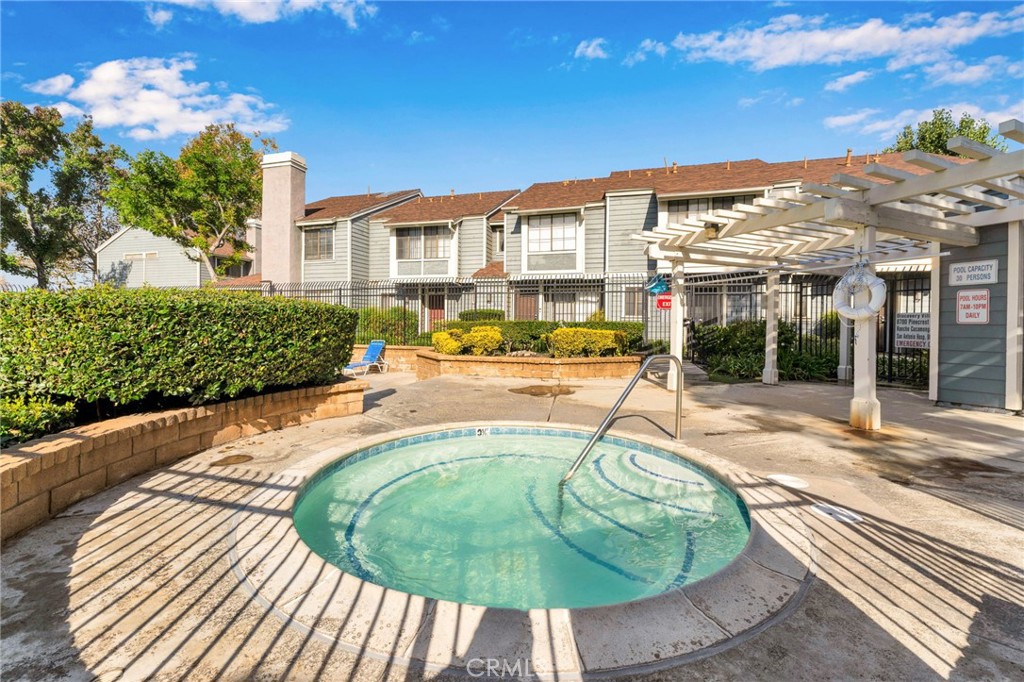8703 Pine Crest Place Rancho Cucamonga, CA 91730 - Photo 29 of 36 a view of a swimming pool with a patio