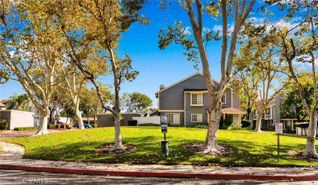 8703 Pine Crest Place Rancho Cucamonga, CA 91730 - Photo 30 of 36 a view of a house with a big yard and large trees