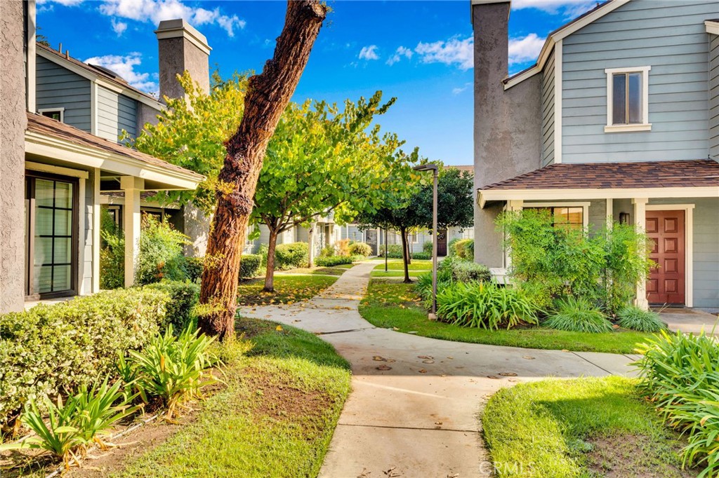 8703 Pine Crest Place Rancho Cucamonga, CA 91730 - Photo 3 of 36 a view of a house with a garden