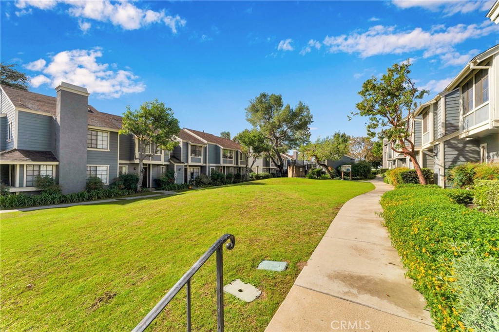 8703 Pine Crest Place Rancho Cucamonga, CA 91730 - Photo 31 of 36 a view of a house with a swimming pool