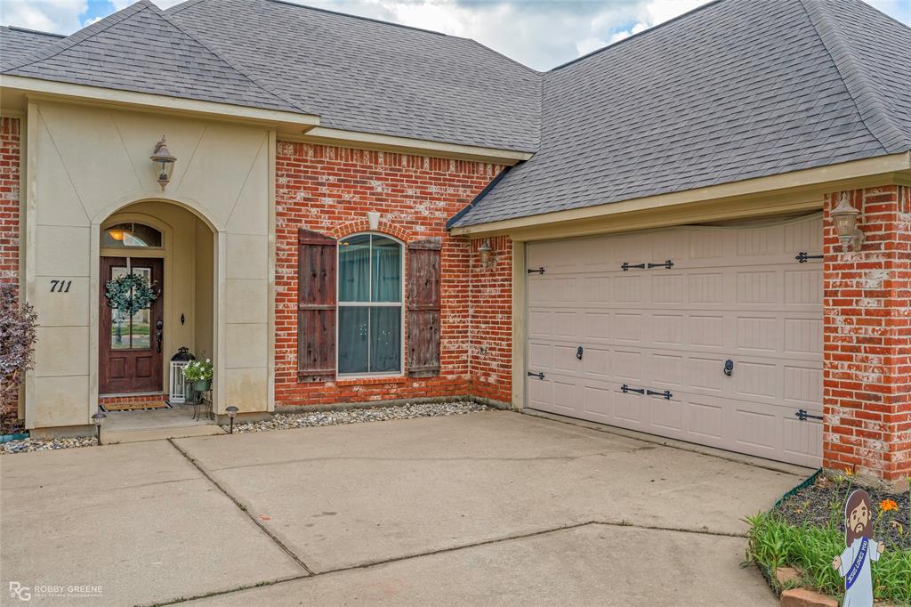 711 Reeds Reef Bossier City, LA 71112 - Photo 3 of 36 a front view of a house