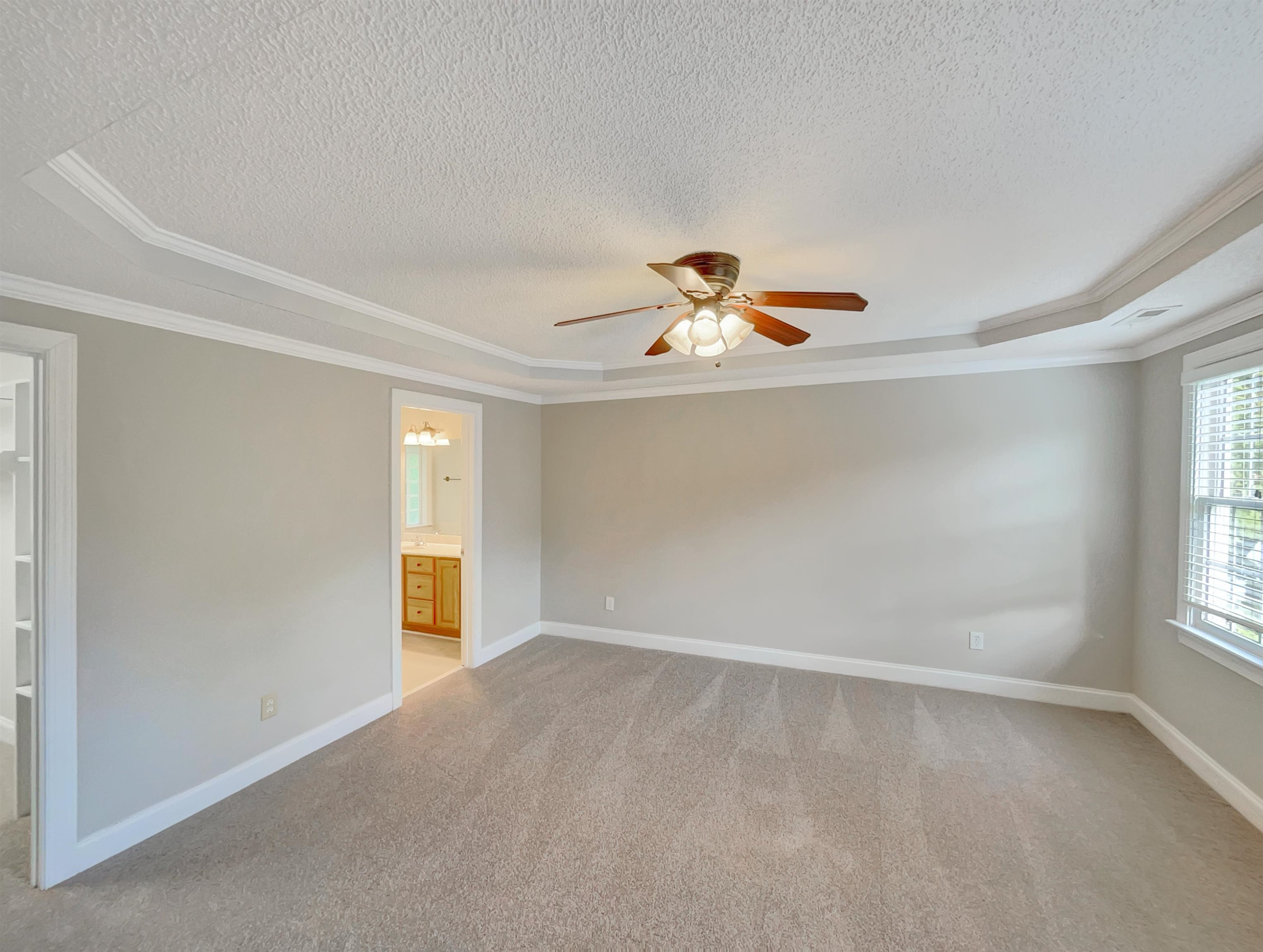 207 Normandy Drive Clayton, NC 27527 - Photo 16 of 25 wooden floor in an empty room with a window