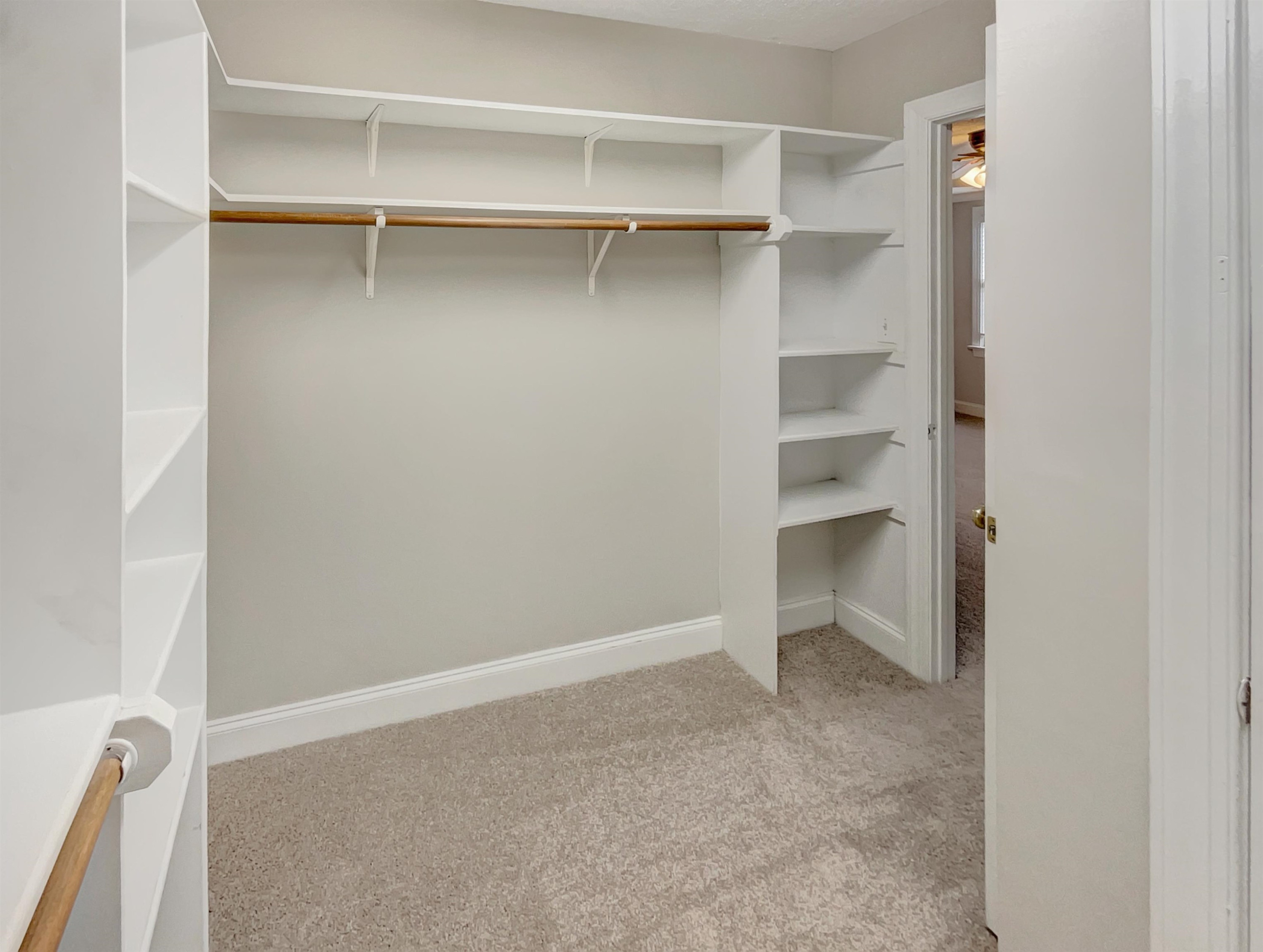 207 Normandy Drive Clayton, NC 27527 - Photo 18 of 25 a view of an empty walk in closet
