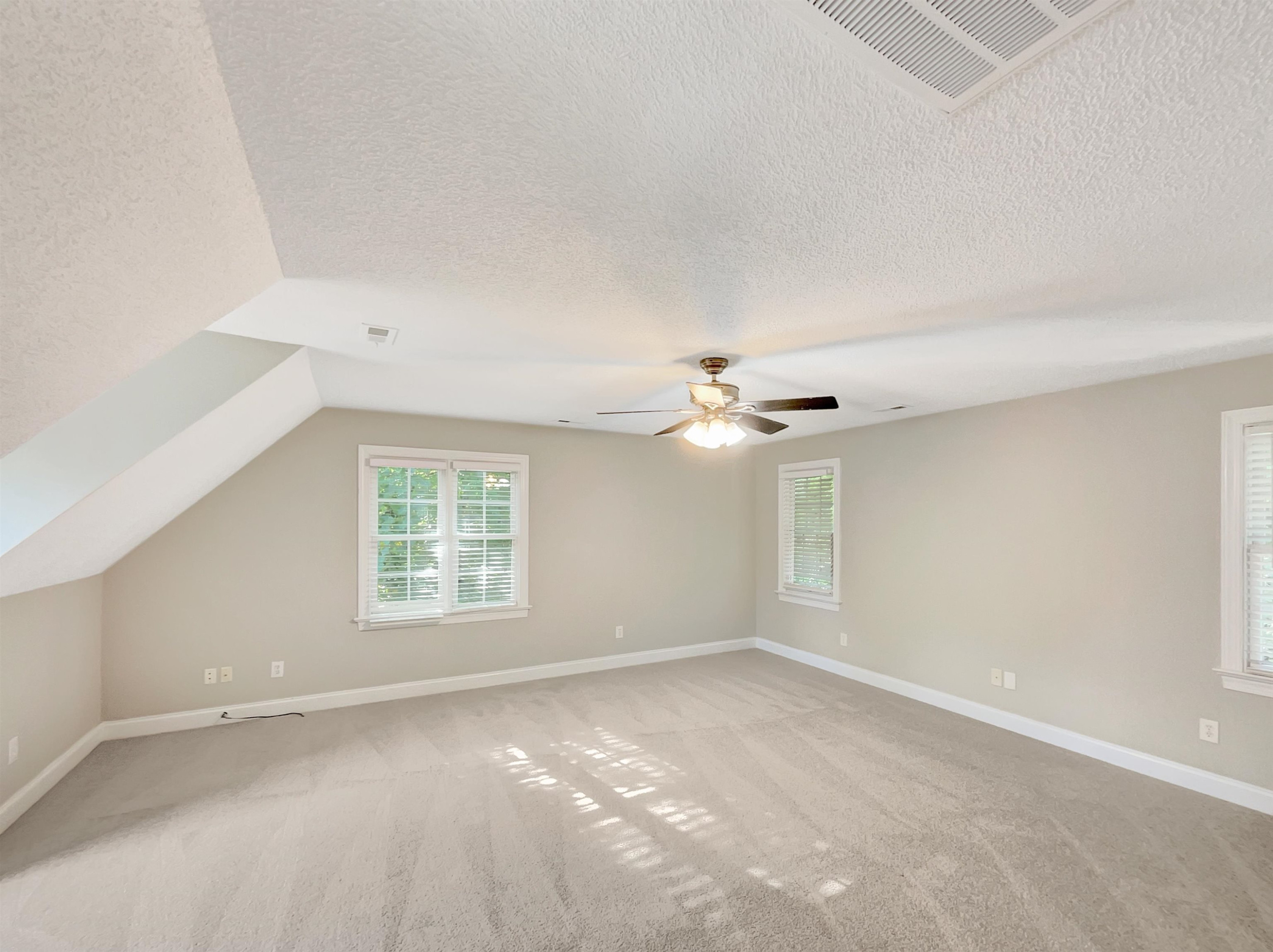 207 Normandy Drive Clayton, NC 27527 - Photo 25 of 25 an empty room with a empty space and windows