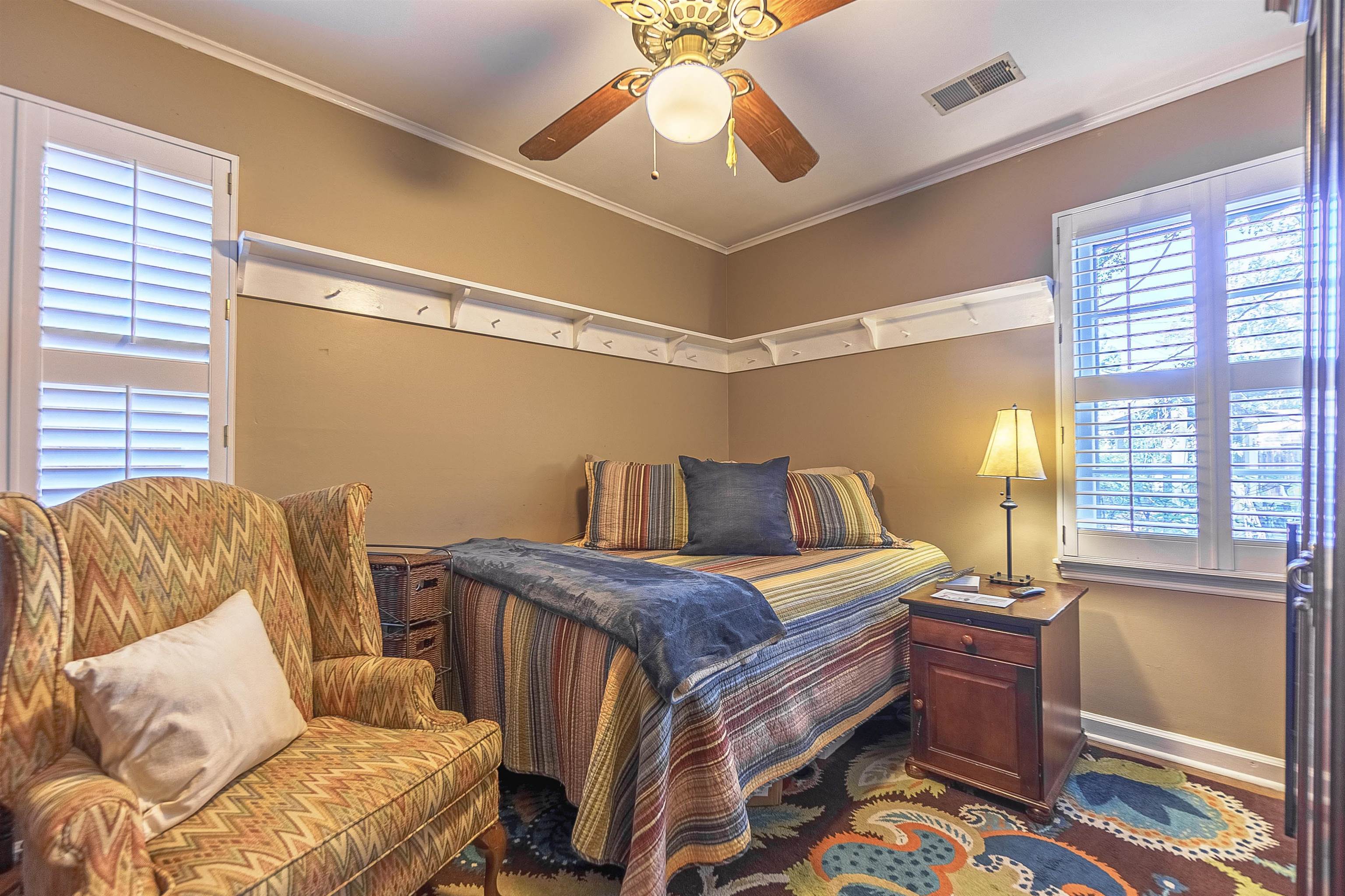 4476 Helene Road Memphis, TN 38117 - Photo 5 of 22 a bedroom with a bed and a window