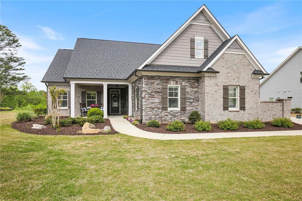 130 Sweetbriar Farm Road Woodstock, GA 30188 - Photo 1 of 1 front view of a house with a yard