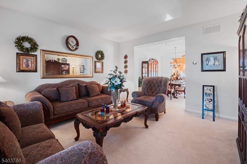 3 Summerfield Drive Princeton, NJ 08540 - Photo 4 of 30 a living room with furniture and a large window