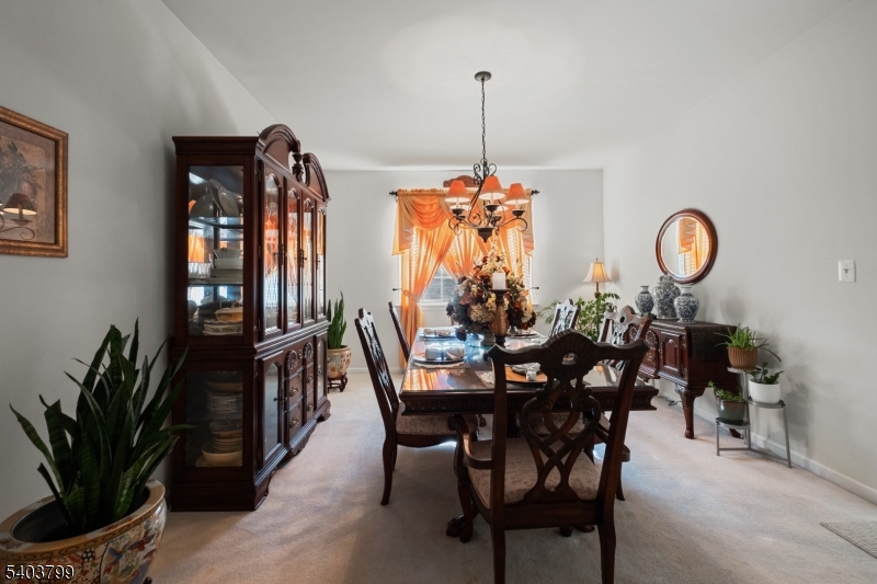 3 Summerfield Drive Princeton, NJ 08540 - Photo 6 of 30 a view of a dining room and a table and chairs