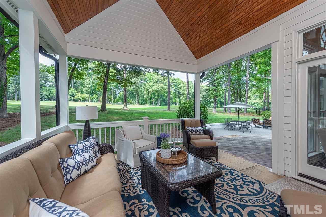 7016 North Ridge Drive Raleigh, NC 27615 - Photo 2 of 30 a balcony with furniture and garden view