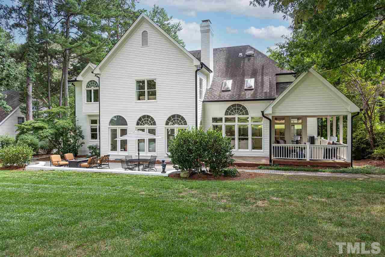 7016 North Ridge Drive Raleigh, NC 27615 - Photo 30 of 30 a front view of house with yard and green space