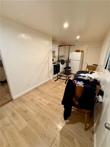 a bed room with a bed and window