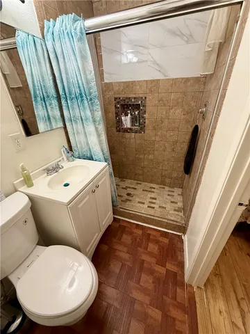 a bathroom with a toilet sink and tub