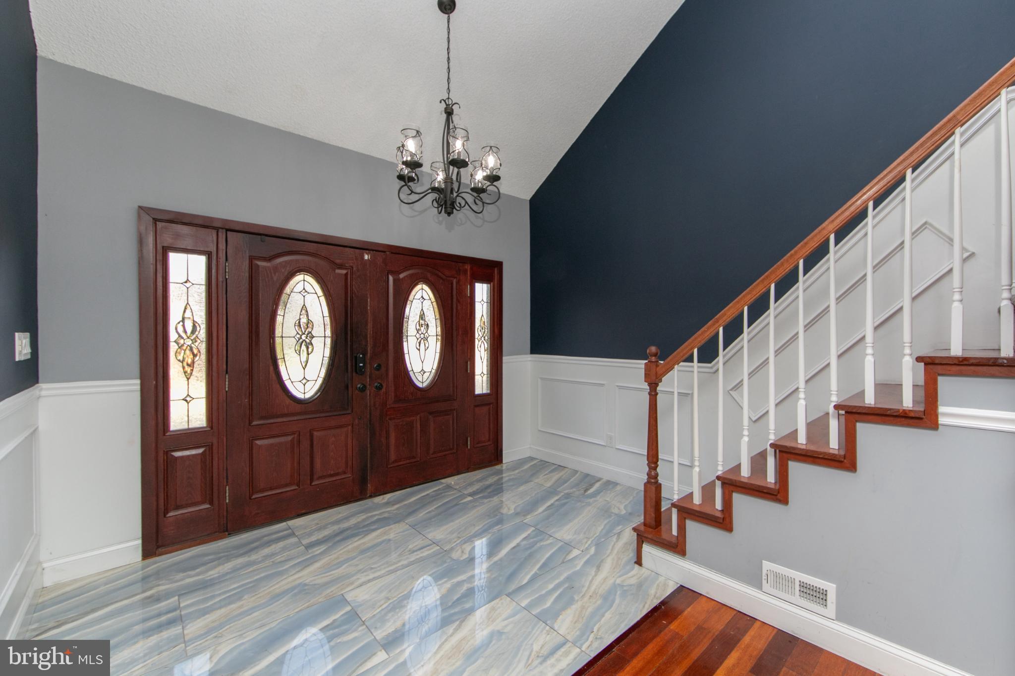 220 Landing Road Blackwood, NJ 08012 - Photo 20 of 63 a view of a hallway with wooden floor and staircase